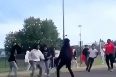 Security guard shot in back of the head while trying to break up fight at high school football game