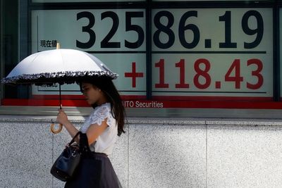 Stock market today: Asian shares trade mixed after Big Tech rally on Wall Street