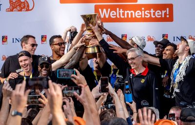 Fans cheer German basketball team's return home after winning World Cup title