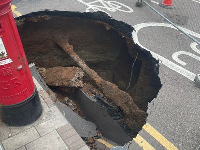 Sinkhole the size of a car appears on London street