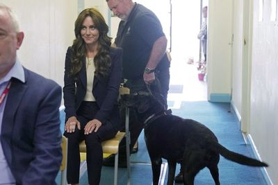 Kate Middleton grins as she’s sniffed by drug sniffer dog during visit to prison