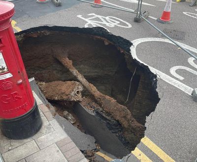Sinkhole the size of a car appears on street in south-east London