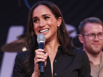 Meghan Markle apologises for being late as she finally joins Harry at Invictus Games