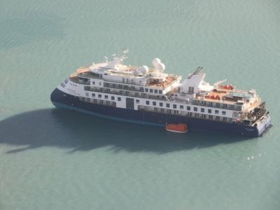 Cruise ship with 206 onboard runs aground in Greenland