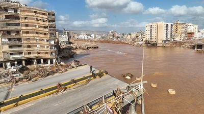 Satellite images show scale of Libya devastation as mass graves used to bury dead