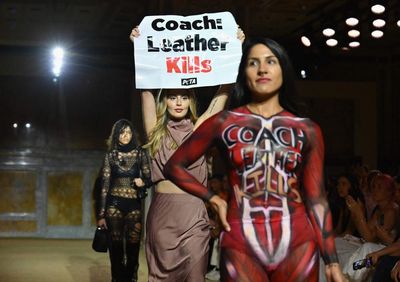 Trash-bag fashionista and Peta protesters storm New York fashion week