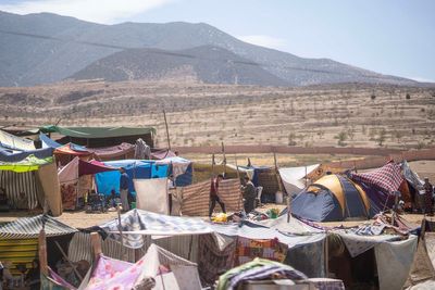 Displaced by earthquake from their mountain homes, Moroccan families brace for shelterless nights