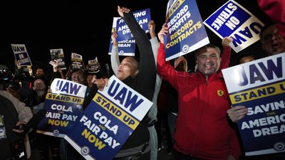 About 13,000 US auto workers go on strike seeking better wages and benefits