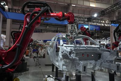 China’s factory output improves, offering hope of easing economic slowdown