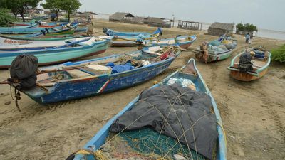 Two Sri Lankan fishermen arrested as their boat comes ashore at Kodiyakkarai coast in Nagapattinam