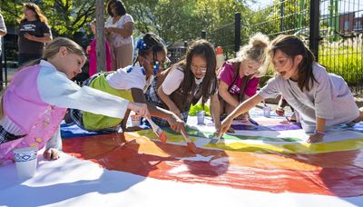 ‘Protect our home:’ Girl Scouts paint mural in support of resident opposition to proposed data center in South Loop