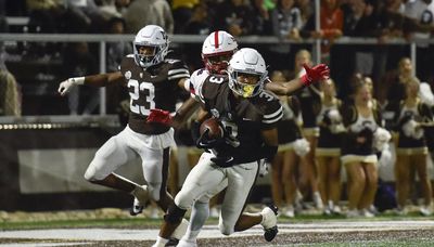 Mount Carmel handles St. Rita, remains undefeated in rivalry game under Jordan Lynch