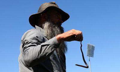 AFLW game delayed by snake lying on field in western Sydney