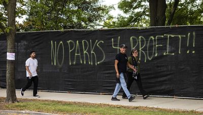 Anti-Riot Fest graffiti greets festival guests at Douglass Park