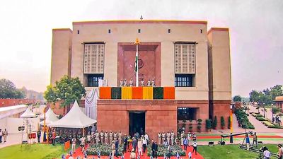 Rajya Sabha Chairman Dhankhar hoists national flag at new Parliament building