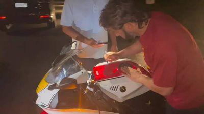 Watch: MS Dhoni delights a fan by giving autograph on bike