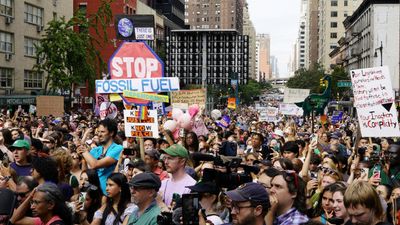 Tens of thousands march against fossil fuels in New York ahead of climate summit
