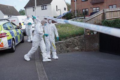 Woman, 35, appears in court charged with murder of her parents