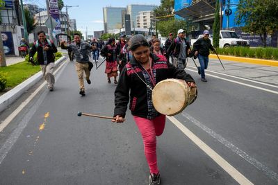 Indigenous supporters march to defend Guatemala's president-elect amid vote fraud allegations