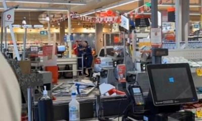 Two people in hospital after car crashes into supermarket in northern NSW