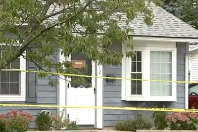 Killer at large after family of four shot dead in Illinois home along with three dogs