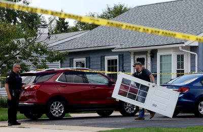 Couple, 2 children and 3 dogs found shot to death in suburban Chicago home