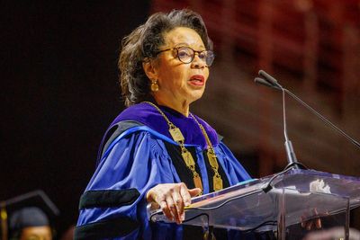Temple University says acting president JoAnne A. Epps has died after collapsing on stage