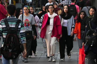 Iran's parliament passes a stricter headscarf law days after protest anniversary