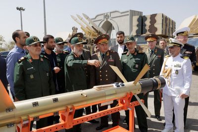 Russian Defence Minister Shoigu tours missile, drone display on Iran visit