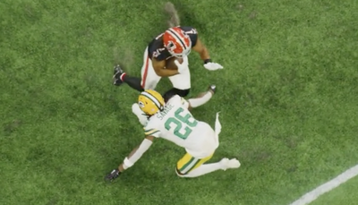 A cool angle of Bijan Robinson’s ridiculous run against the Packers makes him look like an unstoppable blur