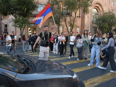 Azerbaijan and ethnic Armenian separatists agree to halt fighting in disputed enclave