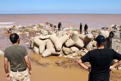 Communication outage hits flood-stricken city in Libya, further complicating search efforts
