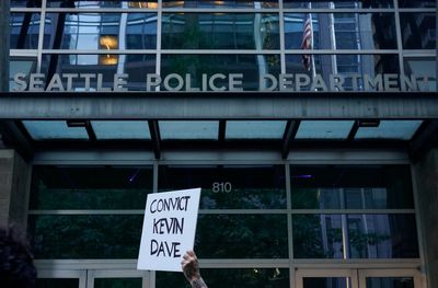 Seattle officer should be put on leave for callous remarks about woman's death, watchdog group says