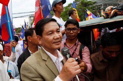 A leader of Cambodia's main opposition party jailed for 18 months for bouncing checks