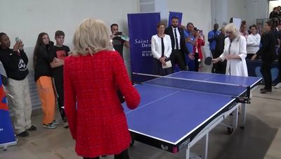 Queen takes on Brigitte Macron in game of table tennis
