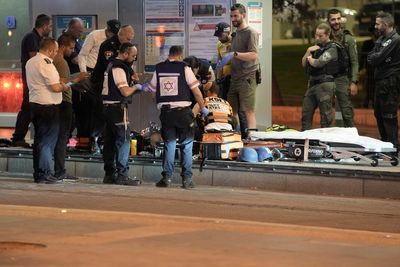 Israeli police shoot a Palestinian after he allegedly stabbed a guard at a Jerusalem train station