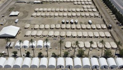 Migrant tent city company accused of controversial ties