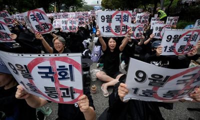 South Korea passes law to protect rights of teachers after mass protests over abuse from parents