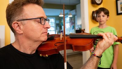Learning to play the violin isn’t easy as an adult when your 11-year-old kid is your teacher