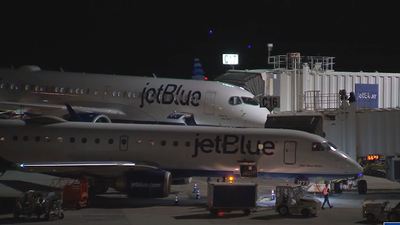 Two Jet Blue planes struck by green lasers near Boston airport, says FAA