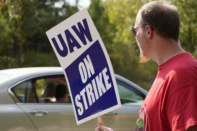 US auto workers expand strike as Biden prepares to join picket line