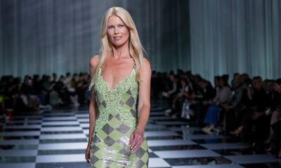 Claudia Schiffer returns to catwalk for Versace collection laden with 1990s nostalgia
