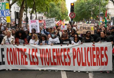 French activists protest racism and police brutality while officers are on guard for key events