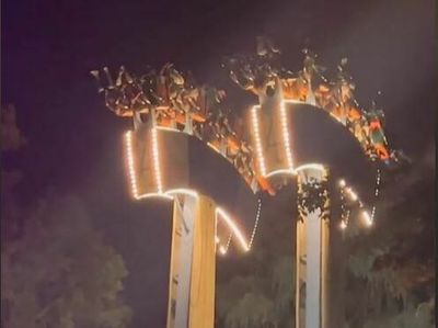 Ride passengers rescued after dangling upside down, 75 feet up, for half an hour