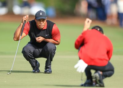 With Tiger Woods as his caddie, Charlie Woods sinks putt on 18 to win Notah Begay event