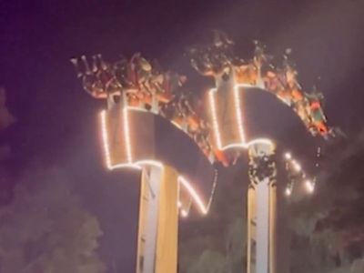 Thrill-seekers left dangling upside down for 30 minutes on amusement park ride