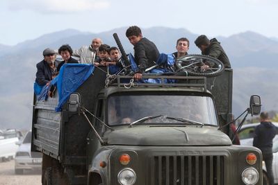 Exasperated residents flee Nagorno-Karabakh after Azerbaijan seizes control of breakaway region