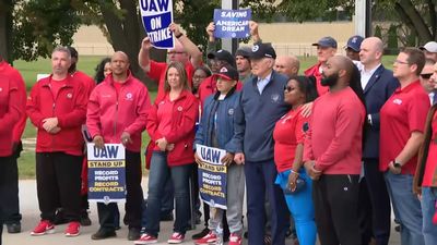 President Biden Makes Historic Visit To Striking UAW Workers On Picket Line