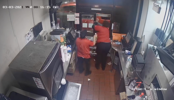 Fast food worker shoots at pregnant customer through drive-thru window in fight over curly fries