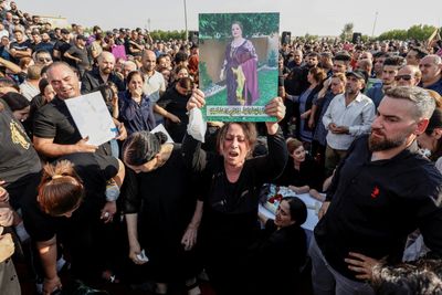 Funerals held as more than 100 killed in Iraq wedding fire